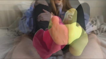 Sockjob in brightly colored mismatched socks