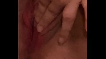 Young girl moans while fucking herself