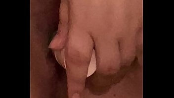 Young girl moans while fucking herself