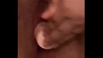 Young girl moans while fucking herself