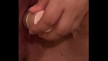 Young girl moans while fucking herself