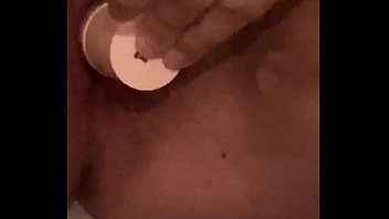 Young girl moans while fucking herself