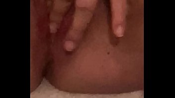 Young girl moans while fucking herself