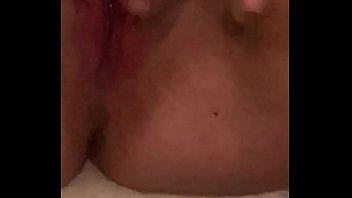 Young girl moans while fucking herself