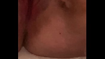 Young girl moans while fucking herself