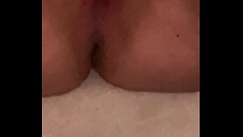 Young girl moans while fucking herself