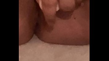 Young girl moans while fucking herself