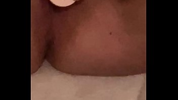 Young girl moans while fucking herself