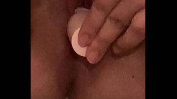 Young girl moans while fucking herself