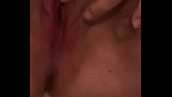 Young girl moans while fucking herself