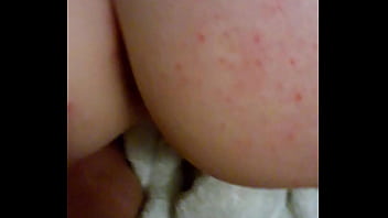 Bent over from behind