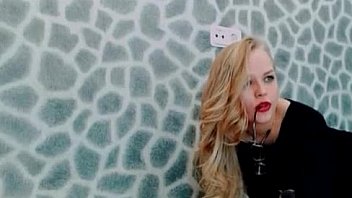 Gorgeous blonde babe plays with her dildo