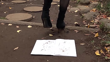 Make dirty shoe footprints on a white notebook