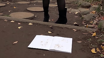 Make dirty shoe footprints on a white notebook