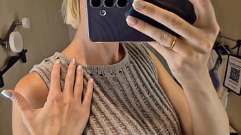 Spying on a blonde with a big ass no panty in a public