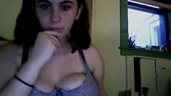 Brunette girl shows her big breast
