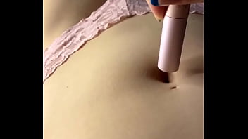 Woman play with her navel