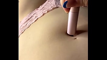 Woman play with her navel