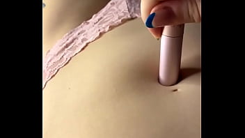 Woman play with her navel