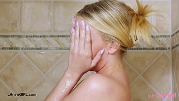 Classic blonde elegance enjoyed a sensual bath