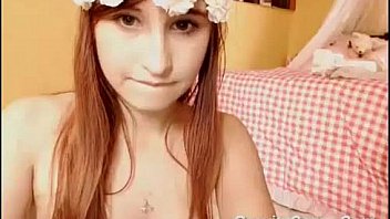 Pretty redhead touching herslef