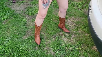 Trashy milf slut pees on the grass in front of other campers at the beach