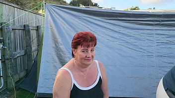 Trashy Milf Slut Pees On The Grass In Front Of Other Campers At The Beach thumbnail