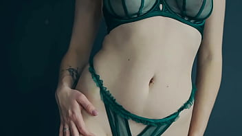 Green lingerie blonde shows her underneath