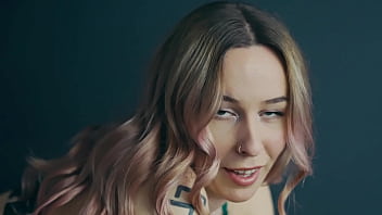 Green lingerie blonde shows her underneath