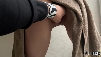 The master deeply fists his obedient slave girl in front of passersby