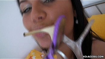 Tanned up brunette heel fucks her eager clitoris