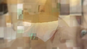 Redhead nurse sucks cock at a gloryhole