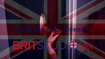 Redhead nurse sucks cock at a gloryhole