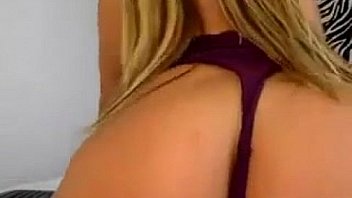 Blonde babe wearing glasses and fishnets