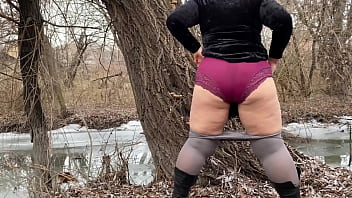 Mother in law in white pantyhoses and big panties pees outdoors