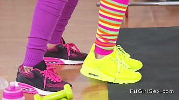 Lesbians works out hula hoops at gym