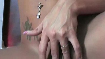 Attractive teen strips on camera and masturbates