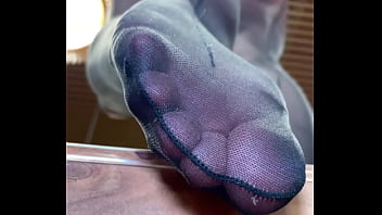 Nylon soles and toes closeup teasing