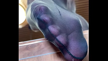 Nylon soles and toes closeup teasing