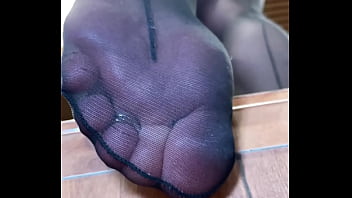 Nylon soles and toes closeup teasing