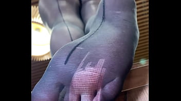 Nylon soles and toes closeup teasing