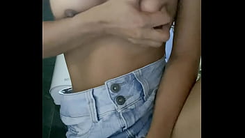 Hot petite in miniskirt fucks her horny pussy