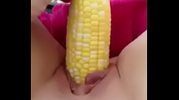 Petite pussy eating corn Petite pussy eating corn