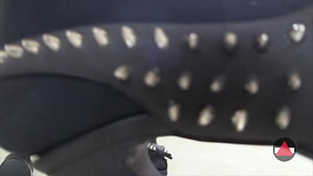 Pantyhose model takes off her shoes