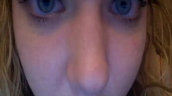 Chubby blonde licks her big tits and puts her underwear inside her pussy