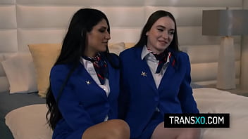 Sexy Shemale And Female Flight Attendants Fuck In The Hotel's Bed thumbnail