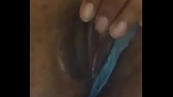 Petite ebony plays with her wet pussy