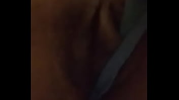 Petite ebony plays with her wet pussy