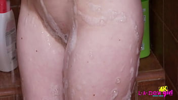 Beautiful brunette teen washes her body Beautiful brunette teen washes her body