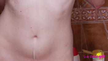 Beautiful brunette teen washes her body